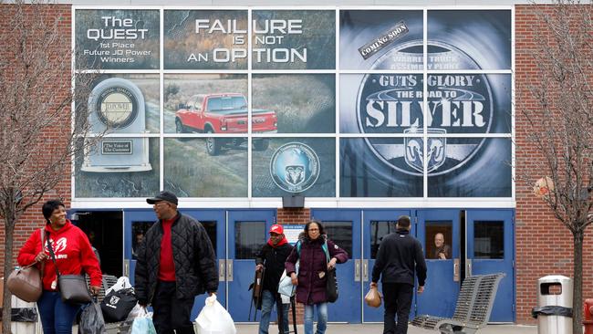 Workers leave a FCA truck plant in Detroit. Picture: AFP