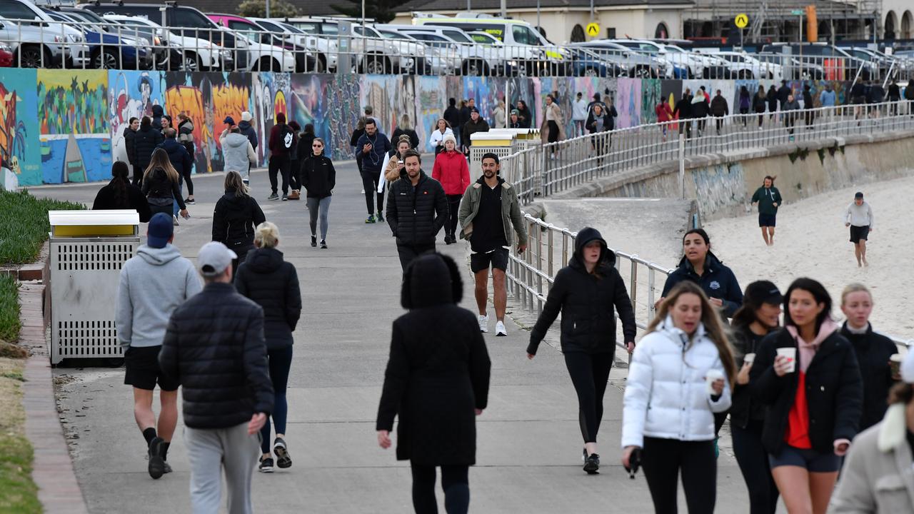 SYDNEY, AUSTRALIA – NewsWire Photos JULY, 21, 2021: People exercise at Bondi Beach in Sydney. Picture: NCA NewsWire/Joel Carrett