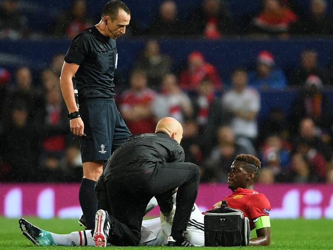 Paul Pogba of Manchester United receives treatment.
