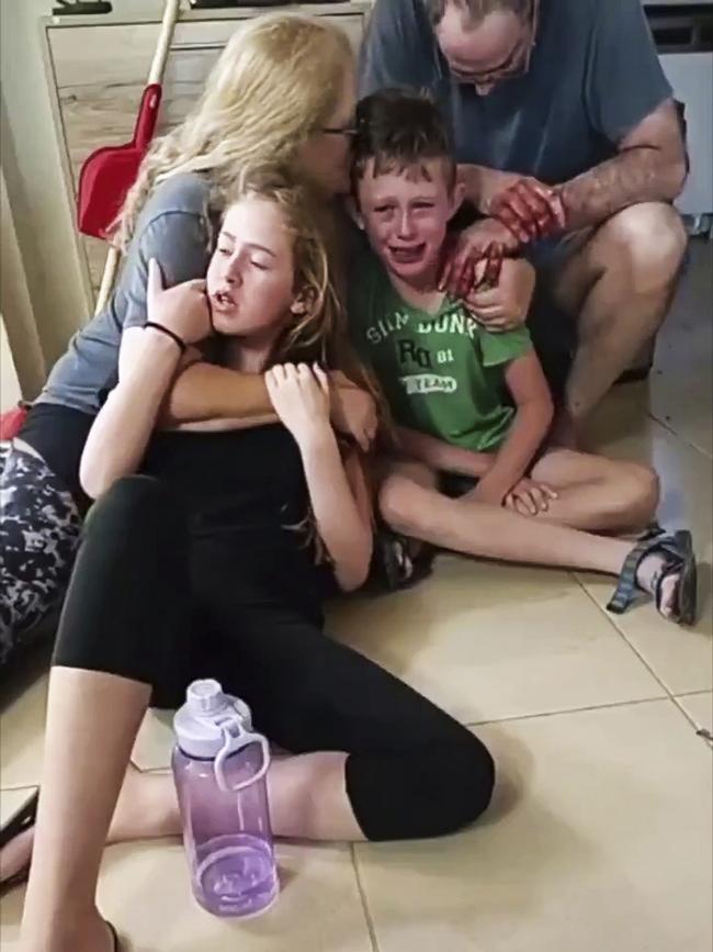 A still from video gathered by Israel Defence Forces shows an Israeli family held hostage by Hamas.