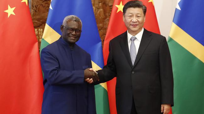 Chinese President Xi Jinping, right, with Prime Minister Manasseh Damukana Sogavare of the Solomon Islands. Picture: Getty Images