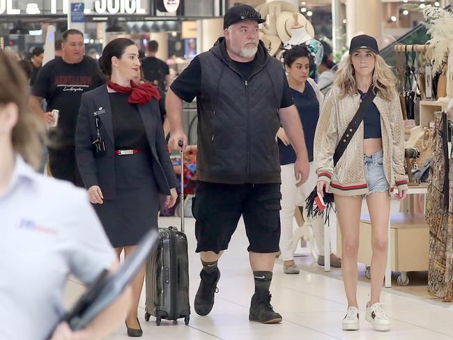 Kyle Sandilands and Tegan Kynaston at Sydney Airport. Picture: DIIMEX