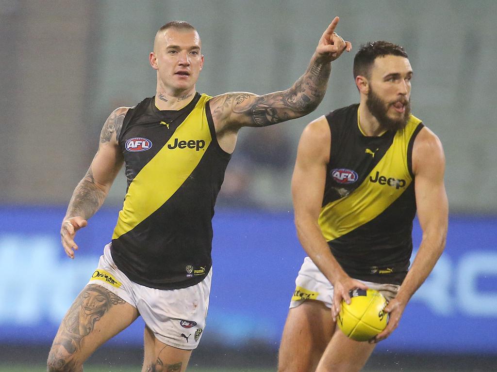 Richmond’s Dustin Martin directs traffic behind Shane Edwards in 2019. Picture: Michael Klein