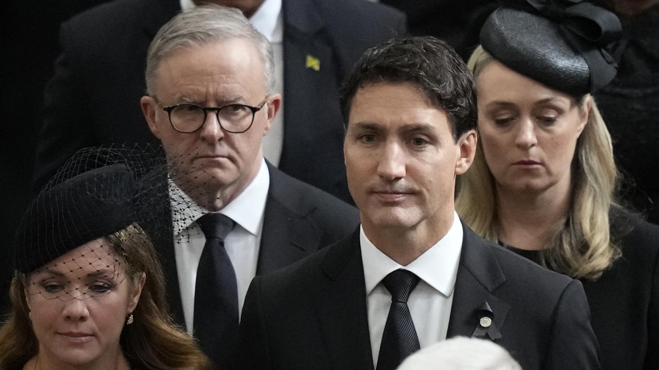 Anthony Albanese and Justin Trudeau arrive together at Westminster Abbey. Getty Images