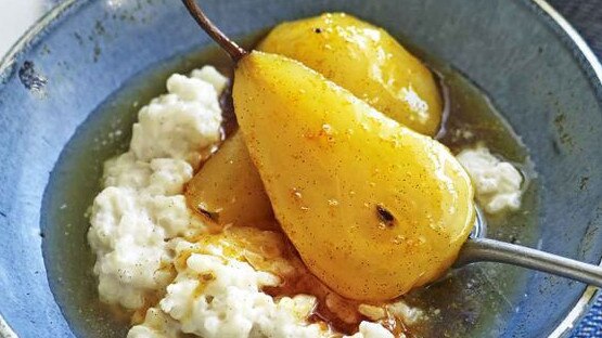 Poached pears with vanilla and coconut rice made in the slow cooker.