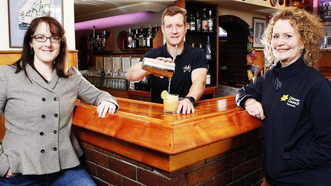 Manager of Shipwrights Arms Hotel, Robb Jubb with a mocktail ahead of Dry July alongside CEO of alcohol, tobacco and other drugs council, Alison Lai and CEO of Cancer Council Tasmania, Penny Egan. Picture: Zak Simmonds