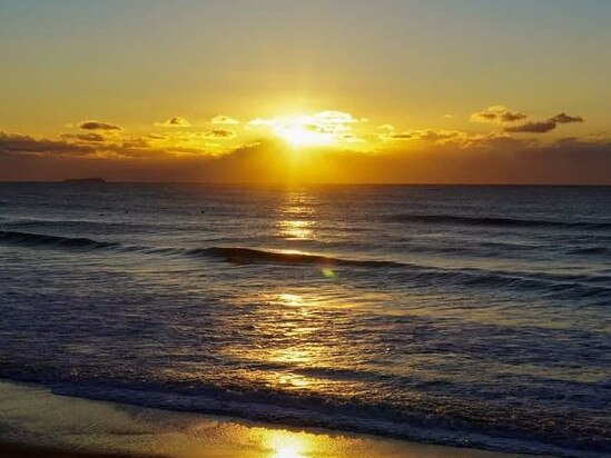 Jamie Lee Stoessel sent in this wonderous shot of the sunrise. Coffs cover image.