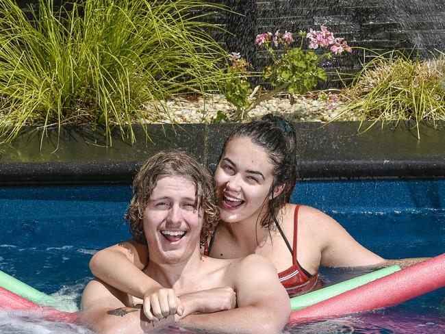 Hot weather Adelaide.With temperatures set to rise into the mid 40's in Adelaide this week the backyard pool is the place to be. Jack Louis 19 and Abbey Whicker 19 of Athelstone enjoy nothing better than to cool off in the pool.Monday 16th December 2019 Pic Roy Vandervegt