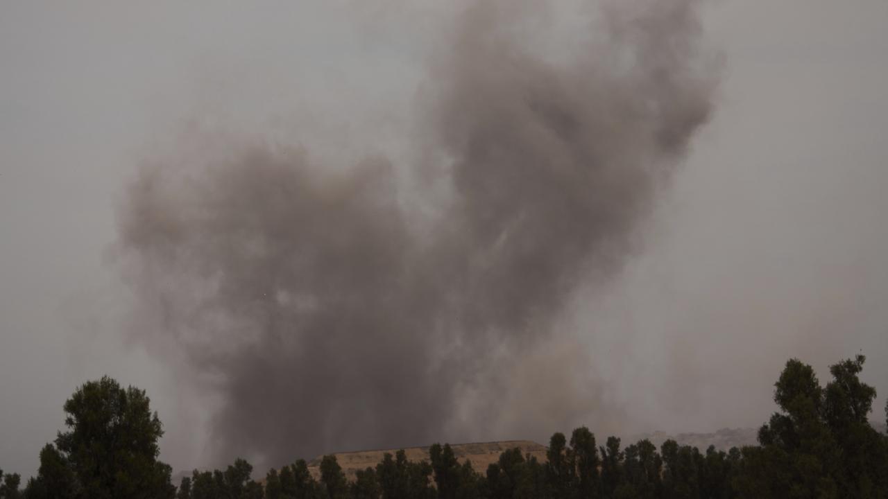 Smoke rises following an Israeli airstrike in the Gaza Strip, as seen from southern Israel, Thursday, May 15, 2025. (AP Photo/Ariel Schalit)