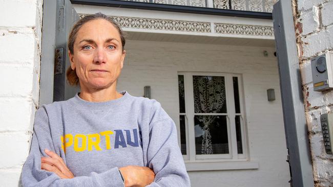 Former champion triathlete Emma Carney is concerned how the new world policy will be implemented.