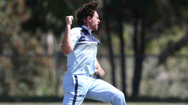 Kane O'Halloran celebrates a wicket for St Francis de Sales. Picture: Stuart Milligan