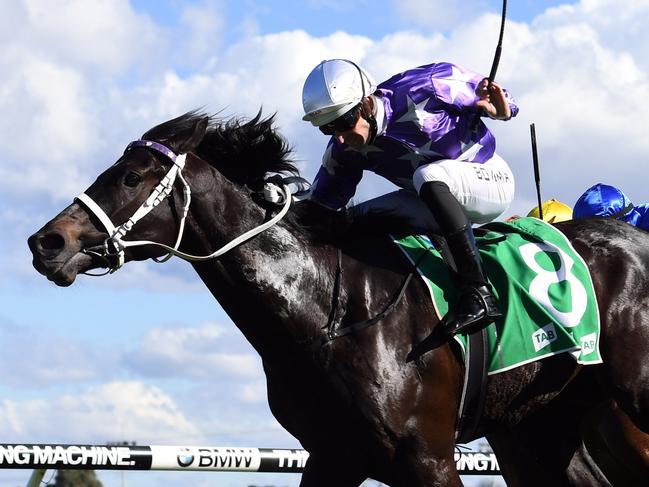 Jockey Hugh Bowman (left) riding Calculated wins race 1 at Canterbury Park Racecourse in Sydney on Wednesday, July 5, 2017. (AAP Image/Paul Miller) NO ARCHIVING, EDITORIAL USE ONLY