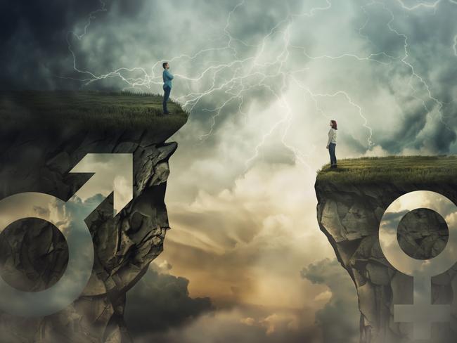 Gender gap idea and sex inequality concept as male and female sign shaped into stone cliff of different size as a metaphor of social issue distinct importance and discrimination in business. Transgender. Istock