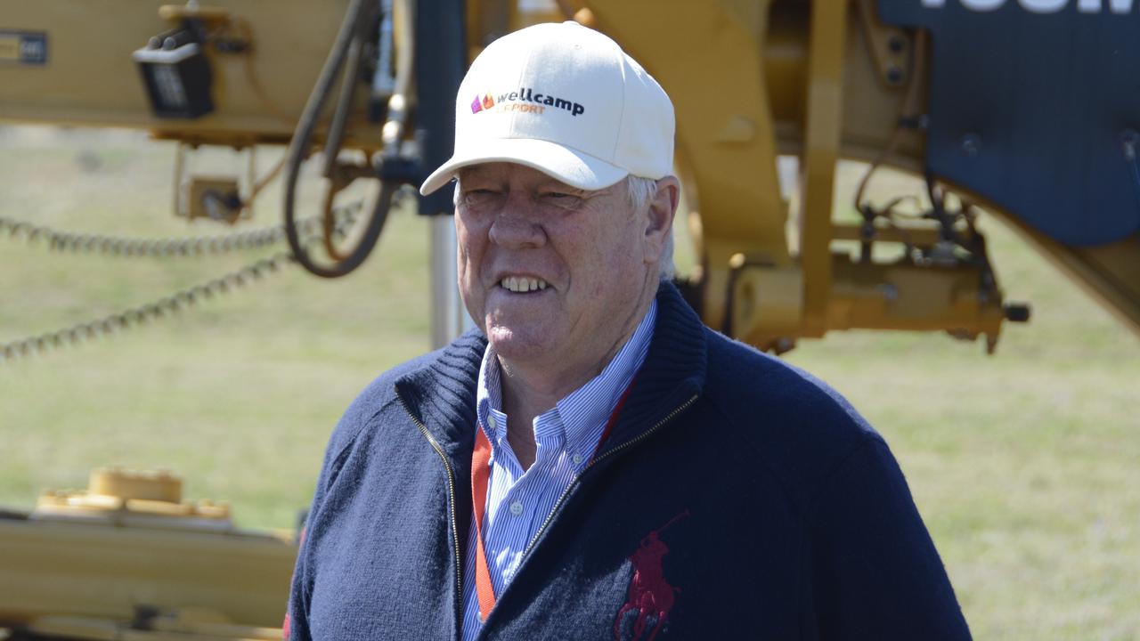 ALL SMILES: Wagner Corporation chairman John Wagner at the announcement a quarantine hub would be built at Wellcamp Airport, owned by the Wagners.