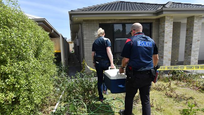 Police are seen at a property in Morphett Vale, Adelaide, on October 8, 2018. More than 100 kilograms of methamphetamine has been seized in a police raid on a clandestine drug lab in Adelaide. Picture: David Mariuz.