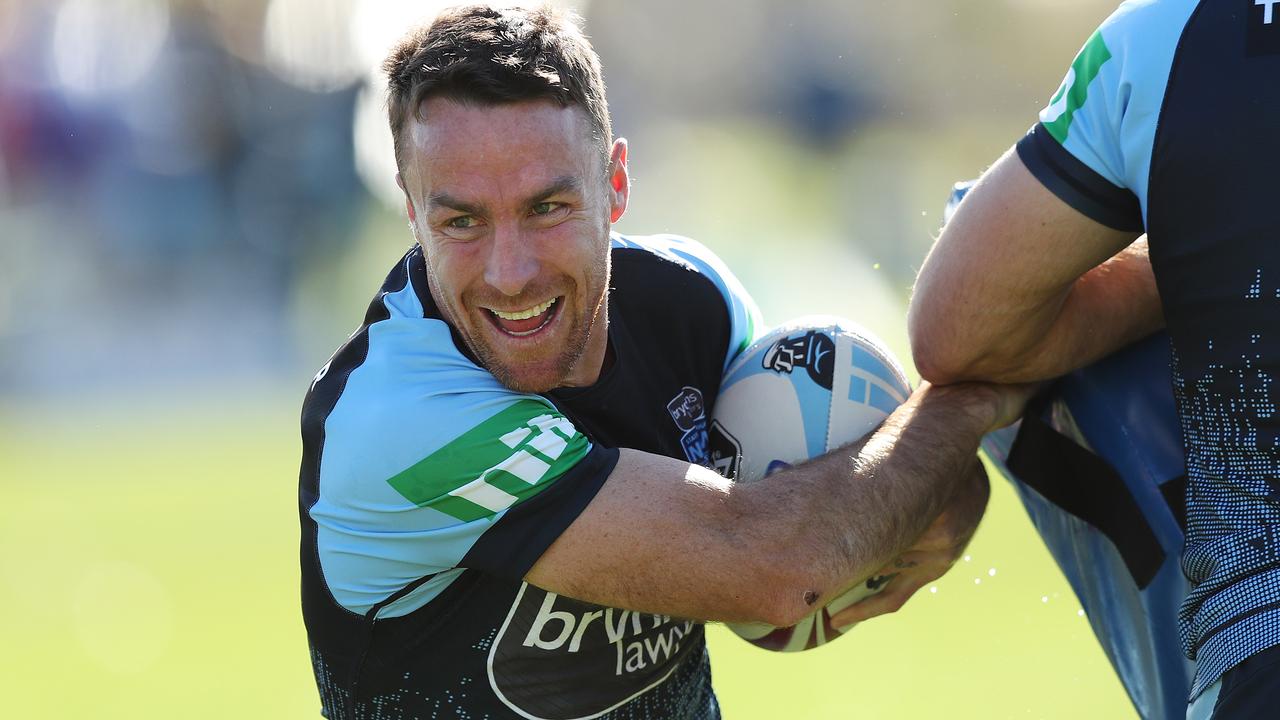 James Maloney after being hit by Josh Addo-Carr during a Blues training session.