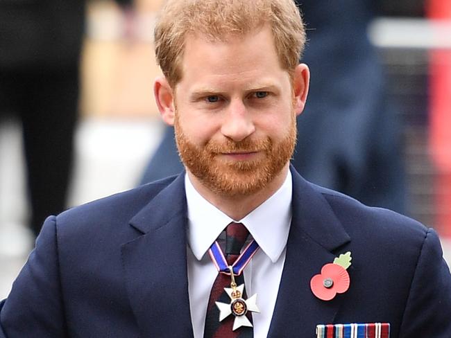 (FILES) In this file photo taken on April 25, 2019 Britain's Prince Harry, Duke of Sussex, arrives to attend a service of commemoration and thanksgiving to mark Anzac Day in Westminster Abbey in London. - Prince Harry on Monday, February 1 formally settled his libel claim against the publisher of The Mail On Sunday and MailOnline over reports he snubbed soldiers after stepping down as a senior royal. (Photo by Daniel LEAL-OLIVAS / AFP)