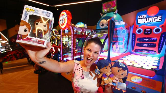 Timezone amusement arcade has opened its doors at the corner of Abbott and Shields Streets in the CBD. Maggie Bryant from Bungalow scored herself plenty of prizes after playing most of the arcade's games. PICTURE: BRENDAN RADKE