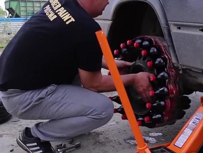 The first attempt didn’t have enough tape to hold the makeshift tyre together. Picture: Garage 54