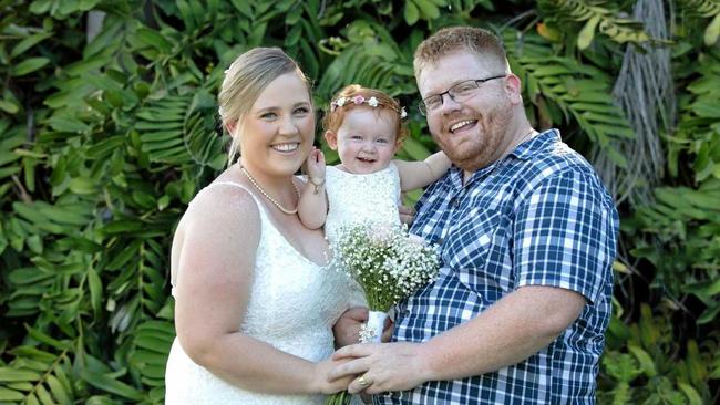 FAMILY: Nicole and Ben Depuit with baby Mia, 21 months, who received the great news that she is now cancer free.