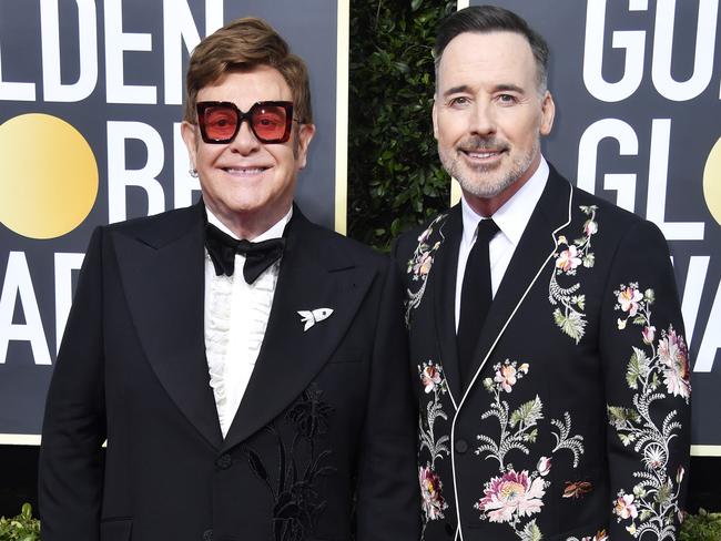 Elton John and David Furnish attend the 77th Annual Golden Globe Awards. Picture: Getty