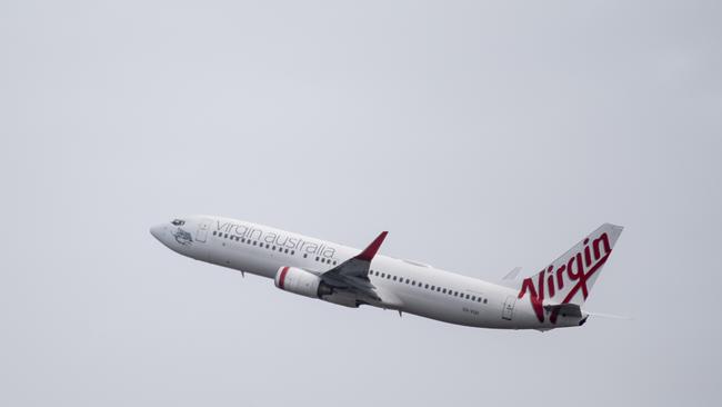 A Virgin Australia aircraft taking off at Sydney Airport. Picture: NCA NewsWire / James Gourley