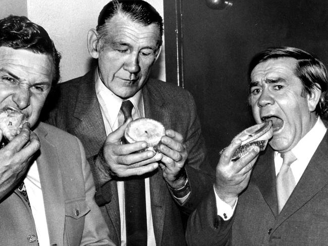 Former footballer TV presenter Bob Davis (l) with Jack Dyer and Lou Richards (r) eating pies on set of TV program 