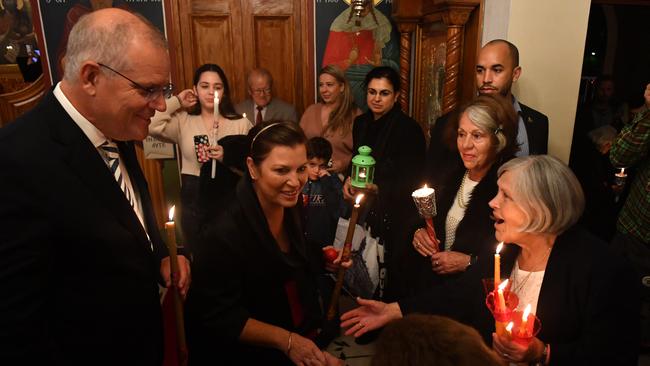 The pair greeted worshippers from the Greek community. Picture: AAP