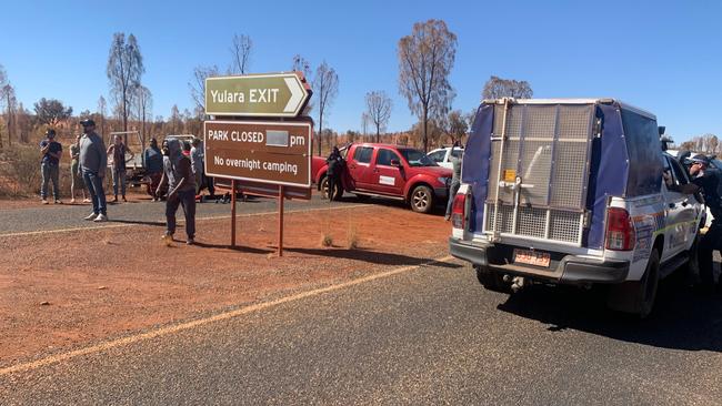 Traditional owners blockaded the entrance to Uluru-Kata Tjuta National Park in protest of Parks Australia for refusing to close the park despite growing fears of tourists arriving from hot spots. Picture: Supplied