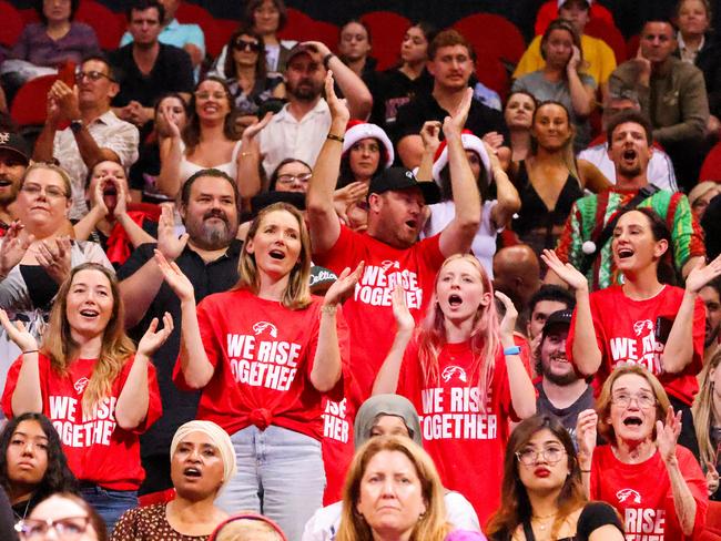 SYDNEY, AUSTRALIA - DECEMBER 25: Hawks fans cheer during the round 12 NBL match between Sydney Kings and Illawarra Hawks at Qudos Bank Arena, on December 25, 2023, in Sydney, Australia. (Photo by Jenny Evans/Getty Images)