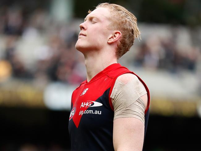 MELBOURNE, AUSTRALIA - AUGUST 26: Clayton Oliver of the Demons looks dejected after a loss during the 2017 AFL round 23 match between the Collingwood Magpies and the Melbourne Demons at the Melbourne Cricket Ground on August 26, 2017 in Melbourne, Australia. (Photo by Michael Willson/AFL Media/Getty Images)