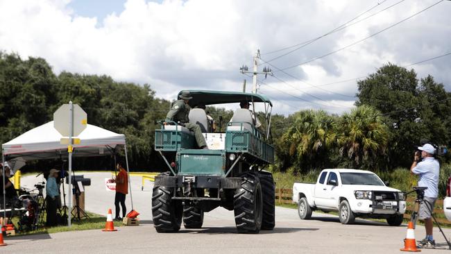 The reserve is alligator and snake infested, with swamps and flooded trails making the search conditions “unforgiving”. Picture: Octavio Jones/Getty Images/AFP.