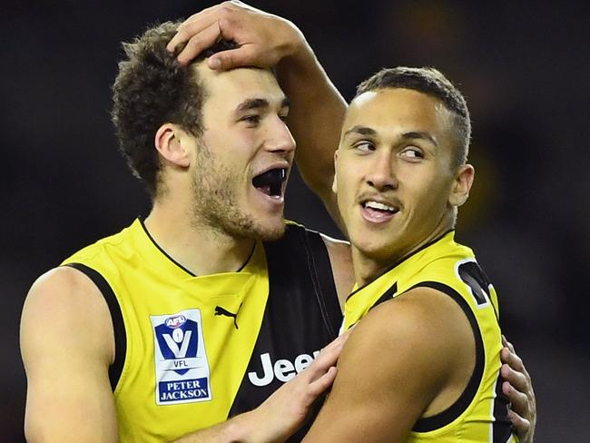 Jacob Ballard (left) celebrates a goal with Shai Bolton. Picture: Getty Images