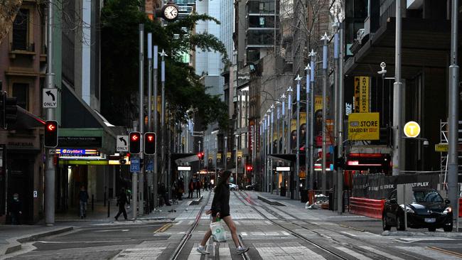 Hardship assistance cases have tripled in the past month as businesses and homeowners struggle through lengthy lockdowns. Above, the Sydney CBD. Picture: Saeed Khan/AFP