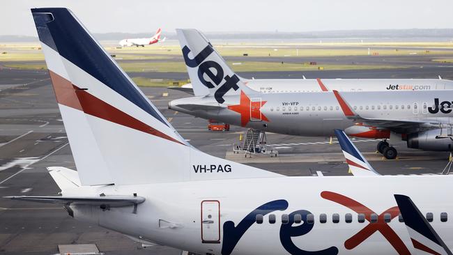 Rex and Jetstar planes at Sydney domestic airport. Picture: Tim Hunter