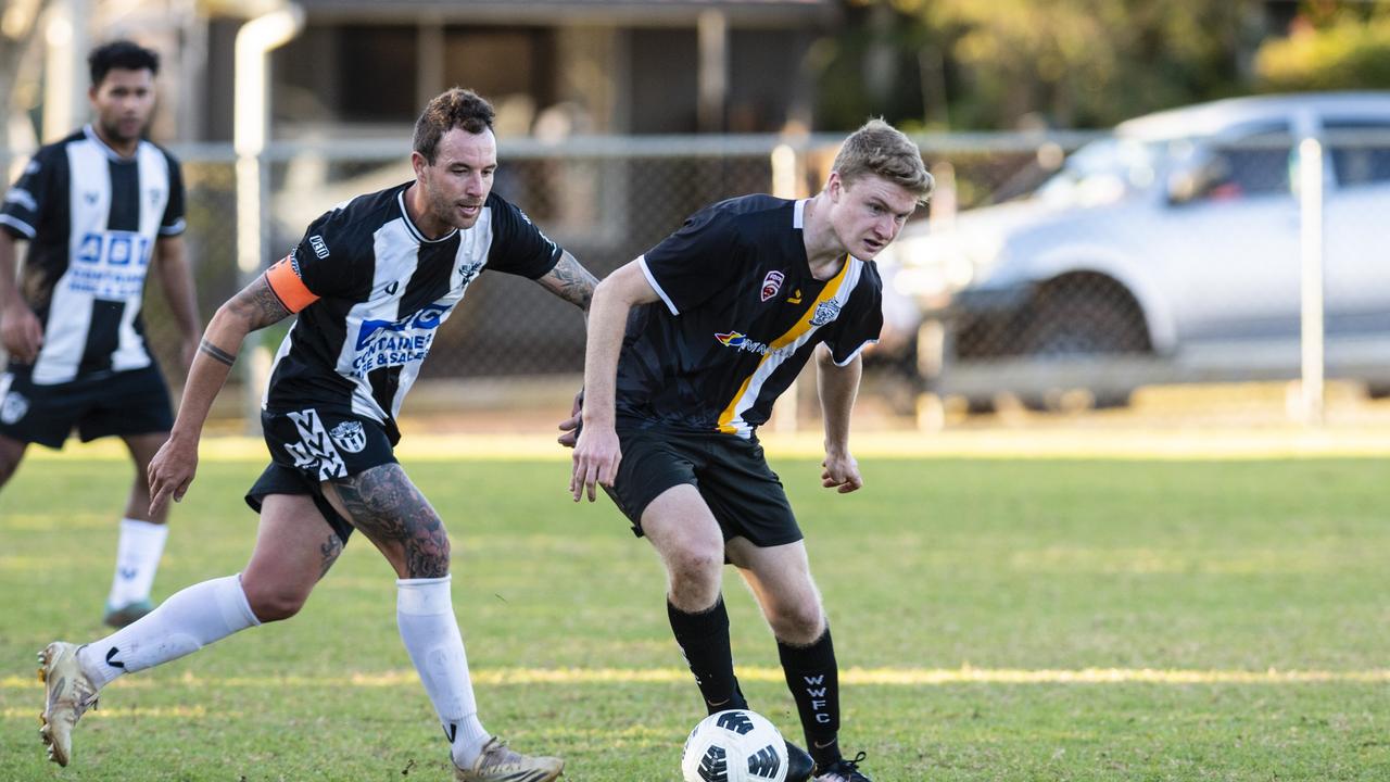 Trent Ingleton (left) of Willowburn and Noah Cochran of West Wanderers in FQPL Men Darling Downs Presidents Cup football at West Wanderers, Sunday, July 24, 2022. Picture: Kevin Farmer