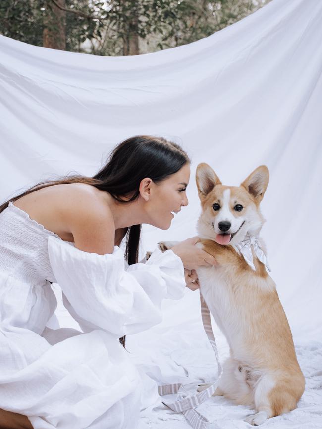 Morgan Harris with her dog Hank who was attacked at a puppy school.