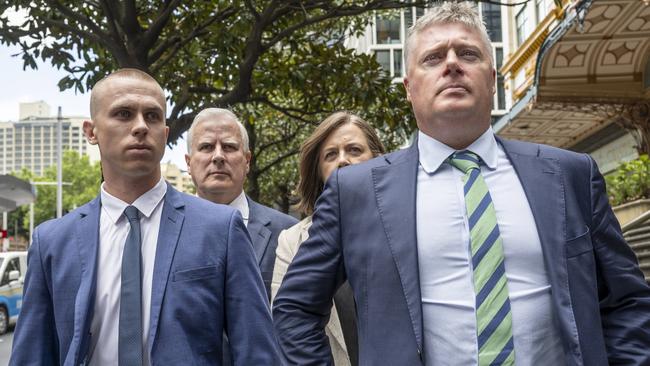 Nicholas McCormack, left, with father Michael McCormack (behind) and lawyer Paul McGirr. Sydney Picture: NewsWire / Monique Harmer