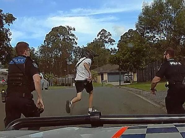 Videos released by police show the moment officers chase down teens and seize several motorbikes in an operation targeting ‘anti-social’ youth behaviour. Photo: Queensland Police