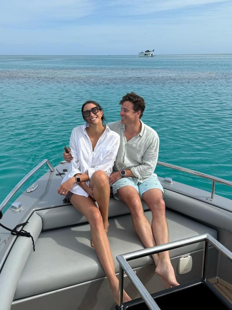 Celebrating their engagement in Hamilton Island wit home rare couple shots posted on Instagram. Picture: Instagram