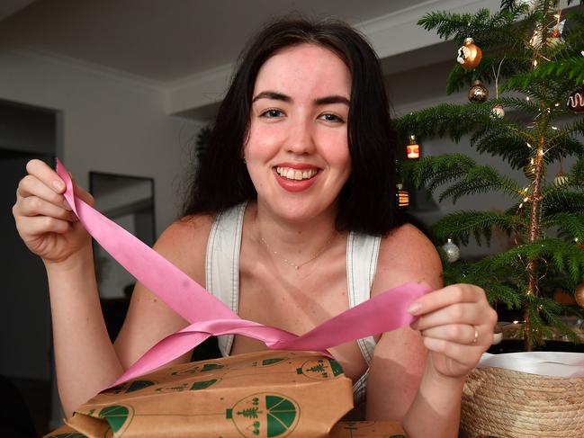 Elle Coonan wrapping gifts for Christmas. Picture: John Gass