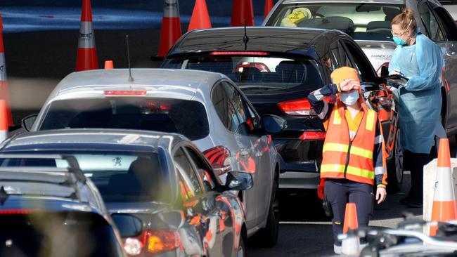 People queuing at the testing centre in St Kilda on Wednesday. Picture: Andrew Henshaw