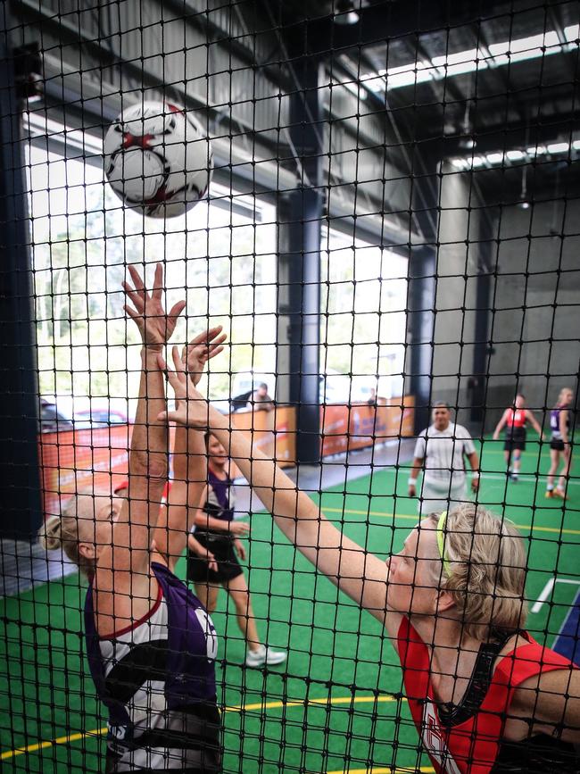 Indoor netball action on the Gold Coast. Picture: Paul Harris Photographer