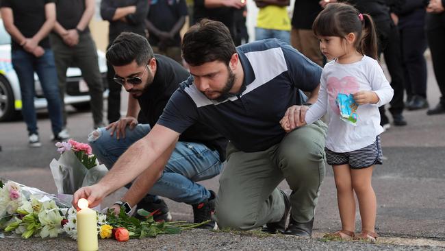 Friends of slain taxi driver Hassan Baydoun mourn outside the Palms Motel in the days after his murder in June 2019. Picture: Keri Megelus