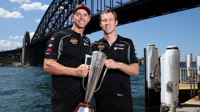 Bathurst 1000 winners David Reynolds (right) and co-driver Luke Youlden show off the Peter Brock trophy. Picture: Toby Zerna