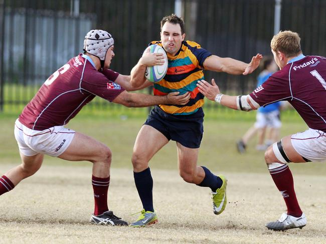 Action from the Brisbane Premier Rugby match between the Gold Coast Breakers and University, held at Rugby Park, Helensvale. Nathan Eyres-Brown breaks University's defensive line.
