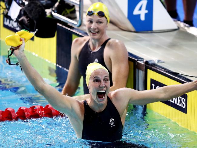 Bronte Campbell celebrates victory over sister Cate in the Women's 100m Freestyle Final. Picture: Hannah Peters/Getty Images