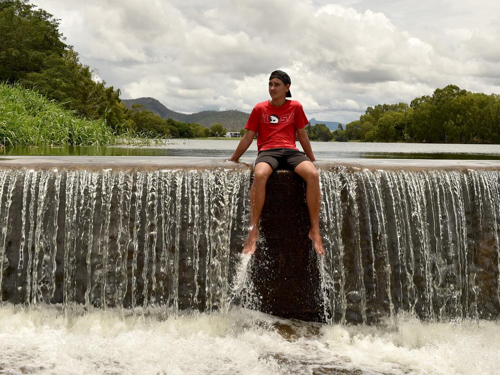 Matthew Lee from Nome at Aplins Weir which is starting to flow after heavy rain. Picture: Evan Morgan