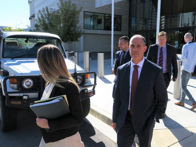 Former AFP deputy commissioner Ramzi Jabbour leaves the ACT Magistrates Court after being cleared of all charges. Picture: Craig Dunlop