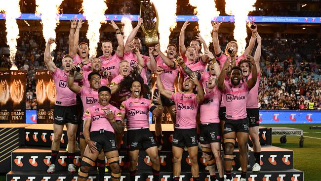 SYDNEY, AUSTRALIA - OCTOBER 06: Isaah Yeo and Nathan Cleary of the Panthers hold aloft the Provan-Summons Trophy after winning the 2024 NRL Grand Final match between the Melbourne Storm and the Penrith Panthers at Accor Stadium on October 06, 2024, in Sydney, Australia. (Photo by Quinn Rooney/Getty Images) *** BESTPIX ***